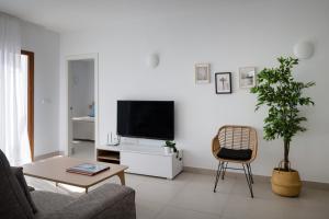 TV a/nebo společenská místnost v ubytování Villas Altos de Lanzarote