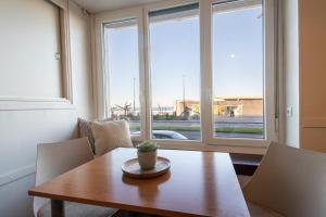 Posezení v ubytování Cozy apartment in front of the beach