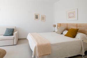 Postel nebo postele na pokoji v ubytování Villas Altos de Lanzarote
