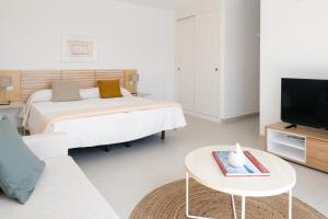 TV a/nebo společenská místnost v ubytování Villas Altos de Lanzarote