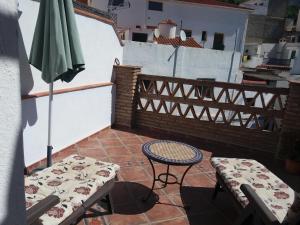 En balkon eller terrasse på Casa Santa Ana