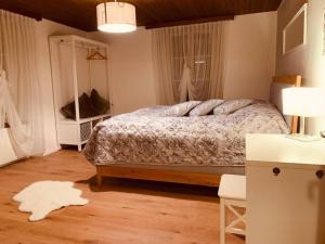 Casa Restelli OG - nahe Andermatt Gotthard客房内的一张或多张床位