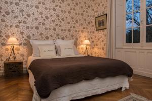 Postel nebo postele na pokoji v ubytování Le Manoir de Bénédicte B&B