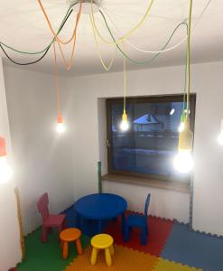 Dětský klub v ubytování Hotel Pizboè