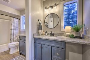 a bathroom with a sink and a mirror at Brian Head Condo Near Lifts at Giant Steps! in Brian Head +18 photos