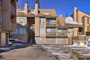 an apartment building with snow on the ground at Brian Head Condo Near Lifts at Giant Steps! in Brian Head