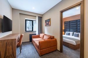 Ένα ή περισσότερα κρεβάτια σε δωμάτιο στο Bristol Hotel and Spa Bakuriani