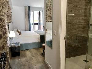 Postel nebo postele na pokoji v ubytování Soléa House Hotel Boutique