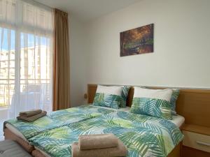 Postel nebo postele na pokoji v ubytování ANITA A 25 Apartment Pool View SUNNY BEACH