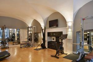 a room with a gym with exercise equipment in it at Home House - Private Member's Club in London
