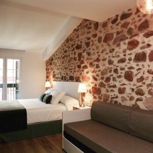 Postel nebo postele na pokoji v ubytování Soléa House Hotel Boutique