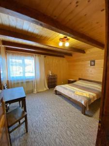 Postel nebo postele na pokoji v ubytování Faina House