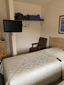 Postel nebo postele na pokoji v ubytování Summer Place Hotel