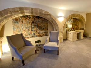 Posezení v ubytování Hôtel des Augustins