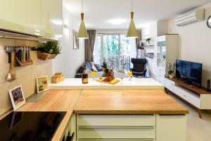 Kuchyň nebo kuchyňský kout v ubytování Green 'n Grey Omiš