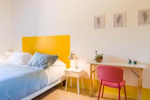 A bed or beds in a room at Tenuta La Santissima