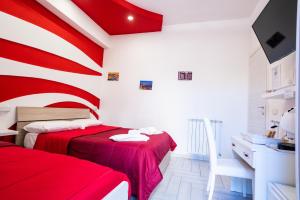 A bed or beds in a room at Terrazza Garibaldi