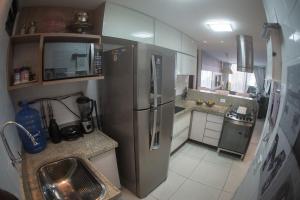 Køkken eller tekøkken på Flat Cabo Branco - Alto Padrao