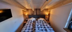 Postel nebo postele na pokoji v ubytování Alpenchalet Valentin