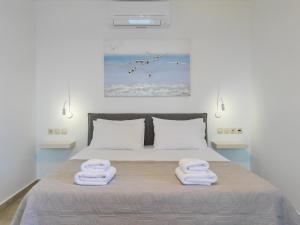 Postel nebo postele na pokoji v ubytování Villa Kalypso Infinity Pool Villa