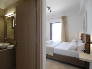 Postel nebo postele na pokoji v ubytování Villa Kalypso Infinity Pool Villa