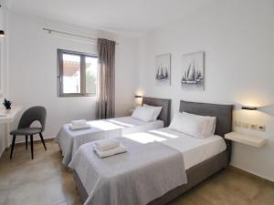 Postel nebo postele na pokoji v ubytování Villa Kalypso Infinity Pool Villa