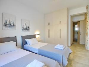 Postel nebo postele na pokoji v ubytování Villa Kalypso Infinity Pool Villa