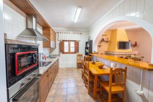 Kuchyň nebo kuchyňský kout v ubytování Villa Tropicana