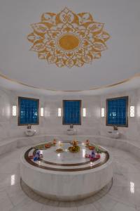 a large room with a large fountain in a building at Rixos Premium Tekirova - The Land of Legends Access in Tekirova