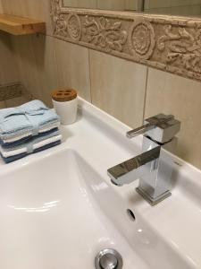 Kúpeľňa v ubytovaní Apartament