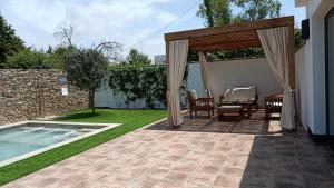 The swimming pool at or close to Casa La Palmera - Sólo Familias y Parejas