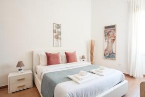 Voodi või voodid majutusasutuse Naro Suites and Rooms toas