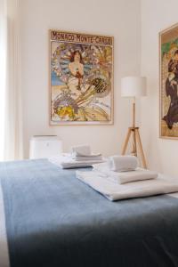 Voodi või voodid majutusasutuse Naro Suites and Rooms toas