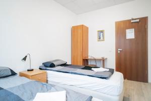 Postel nebo postele na pokoji v ubytování Guesthouse Pavi