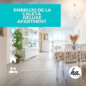 een afbeelding van een kamer met een tafel en stoelen bij El Embrujo de La Caleta Ha Apartment in Cádiz