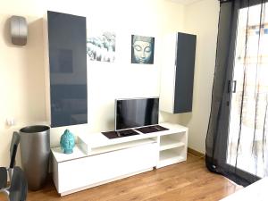 TV a/nebo společenská místnost v ubytování Playa Honda Lovely Home Las Americas -