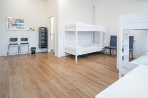 Rúm í herbergi á Guesthouse Pavi