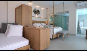 Fotografie z fotogalerie ubytování Paralia Luxury Suites v destinaci Agios Stefanos