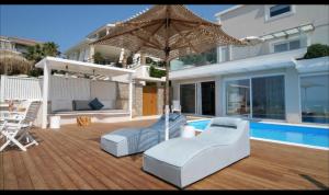 Fotografie z fotogalerie ubytování Paralia Luxury Suites v destinaci Agios Stefanos