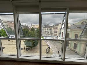 Nespecifikovaný výhled na destinaci Lugo nebo výhled na město při pohledu z apartmánu
