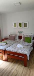Postel nebo postele na pokoji v ubytování Apartments Mare