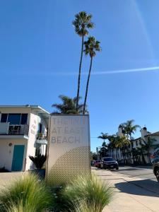 a sign that reads the inn at least least beach at Inn at East Beach in Santa Barbara
