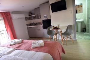 Studio Apartments Bulevar客房内的一张或多张床位