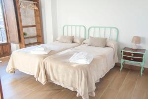 Postel nebo postele na pokoji v ubytování Hotel Rural El Cedro