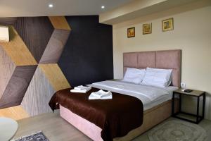 Studio Apartments Bulevar客房内的一张或多张床位