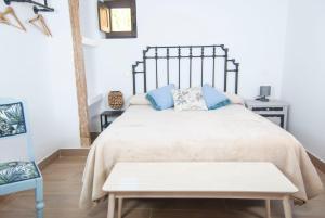 Postel nebo postele na pokoji v ubytování Hotel Rural El Cedro