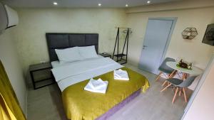 Studio Apartments Bulevar客房内的一张或多张床位