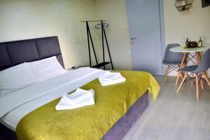Studio Apartments Bulevar客房内的一张或多张床位