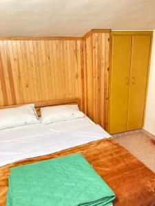 Postel nebo postele na pokoji v ubytování Tamerland-faraya