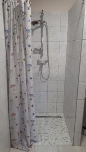 Kúpeľňa v ubytovaní Kis Ház Apartman